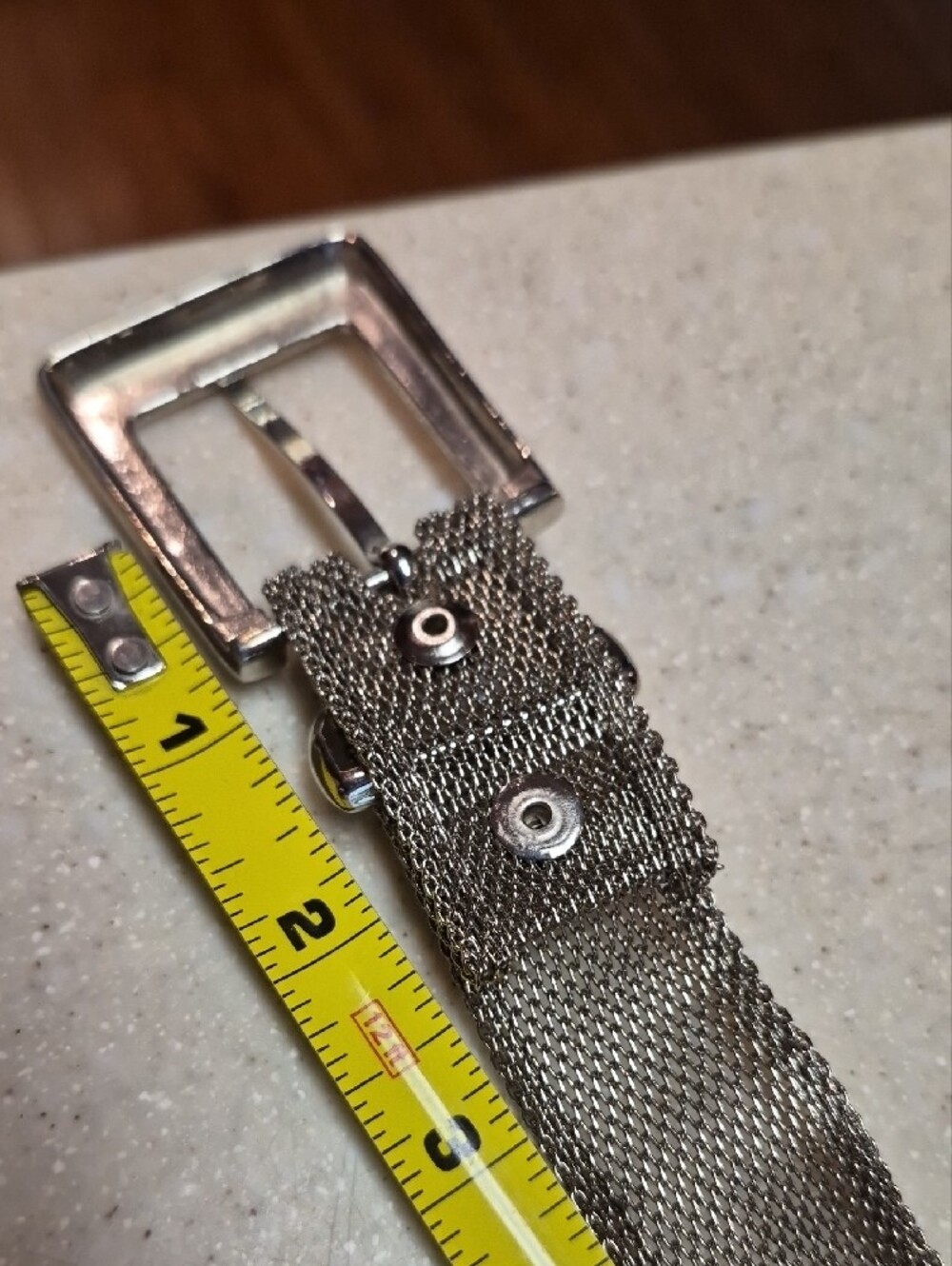 silver-toned metallic belt features a mesh chain construction - Picture 4 of 4